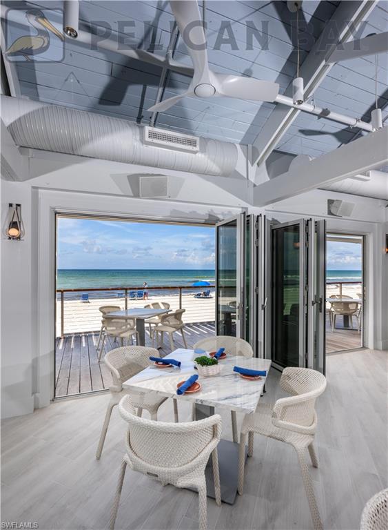 5929 Chanteclair Drive, Unit 8 Naples, FL 34108 - Photo 25 of 28 Sand Bar dining with a view!