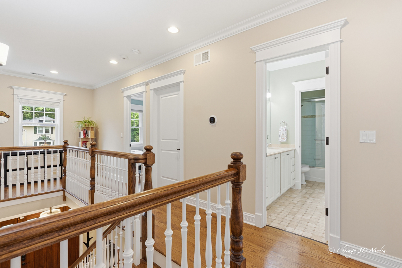 306 17th Street Wilmette, IL 60091 - Photo 31 of 48 a view of a hallway with dining room and furniture