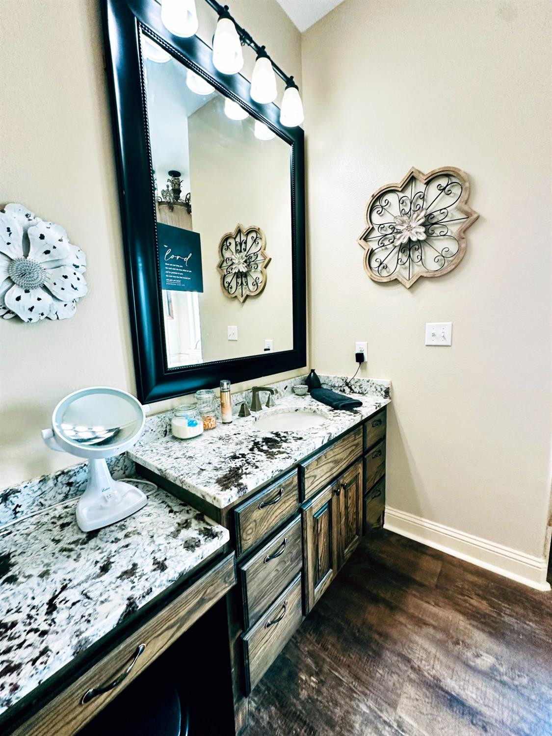 986 County Road 224 Post, TX 79356 - Photo 20 of 42 a bathroom with a granite countertop sink and a mirror