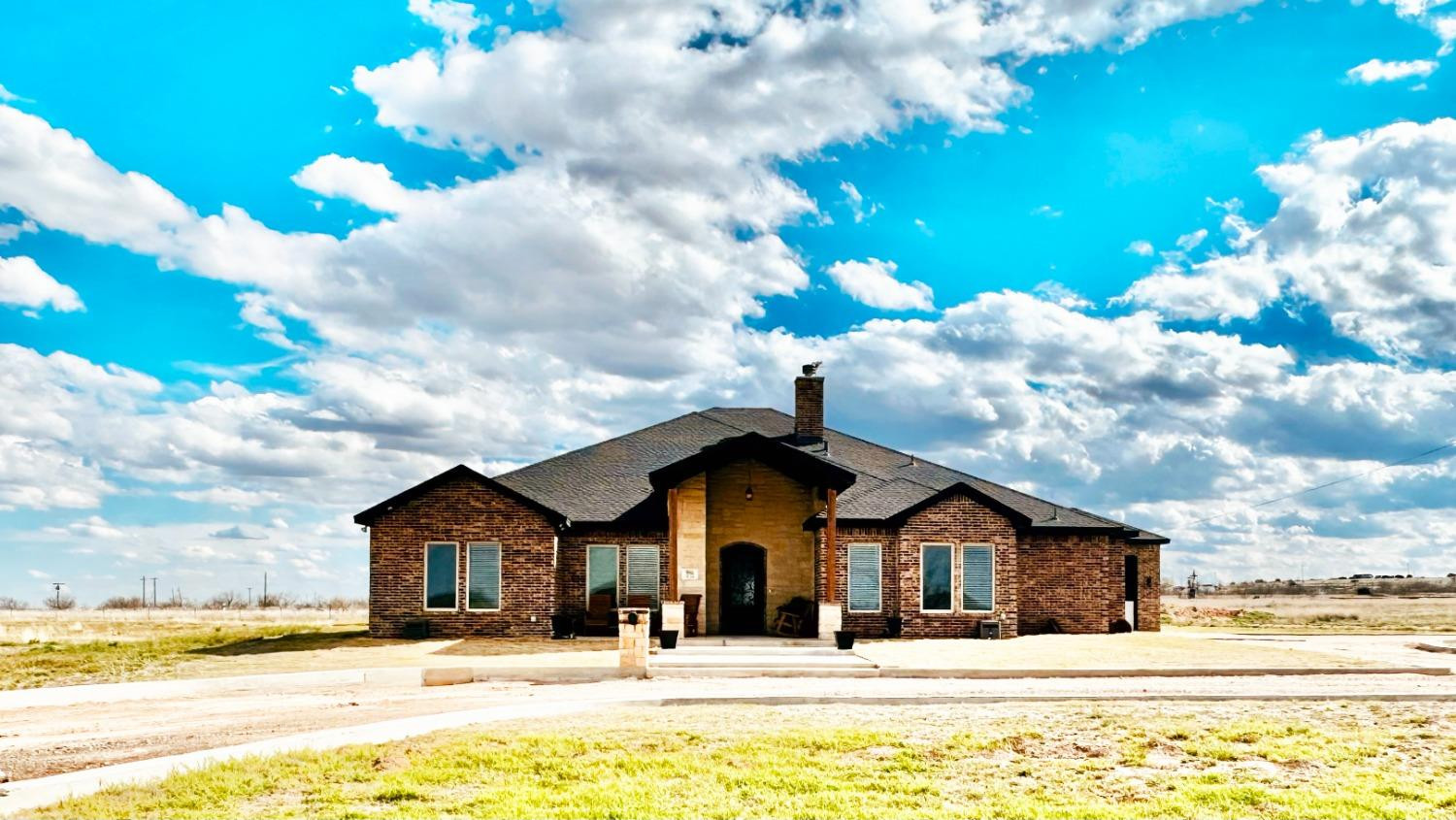 986 County Road 224 Post, TX 79356 - Photo 42 of 42 a front view of a house with a yard