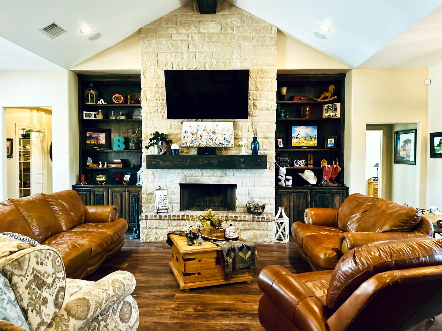 986 County Road 224 Post, TX 79356 - Photo 7 of 42 a living room with fireplace furniture and a flat screen tv