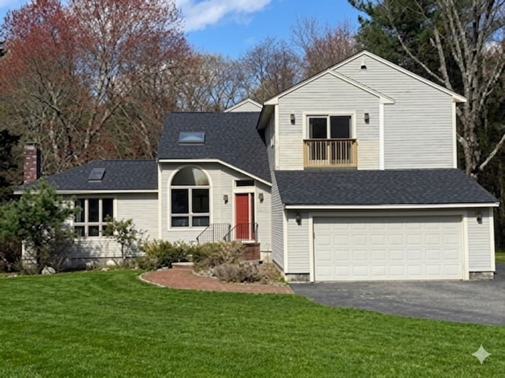 7 Tisdale Road Sharon, MA 02067 - Photo 1 of 37 a front view of a house with a yard and garage