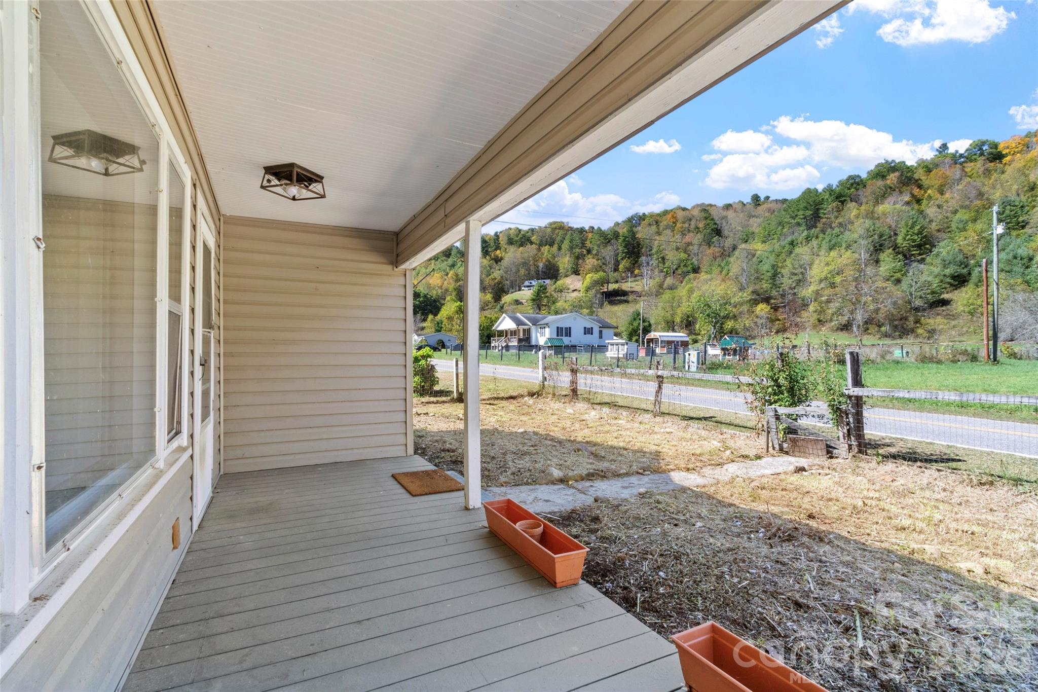 689 Bald Mountain Road Burnsville, NC 28714 - Photo 18 of 21 a view of a porch