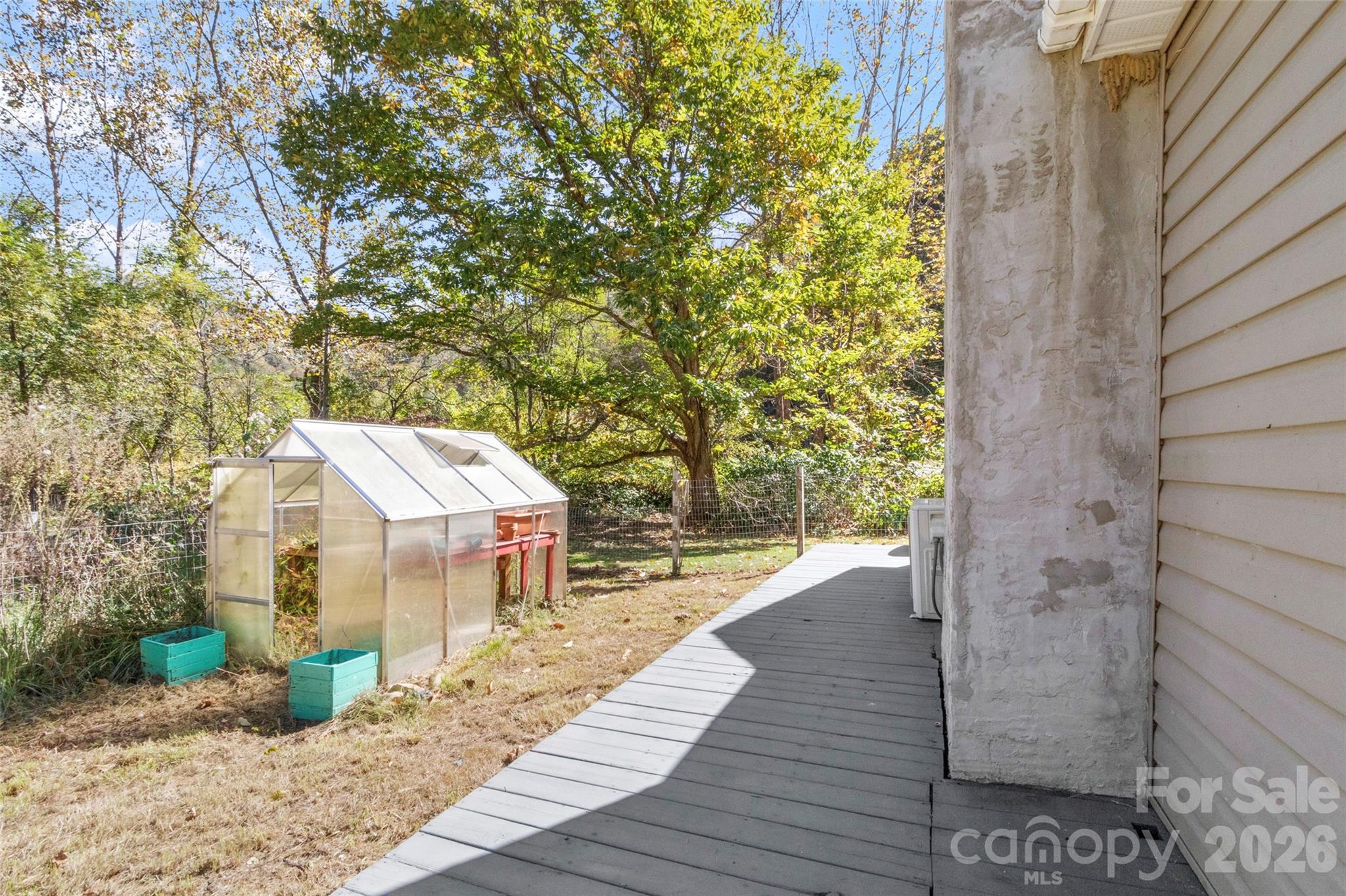 689 Bald Mountain Road Burnsville, NC 28714 - Photo 19 of 21 a view of a pathway with a patio