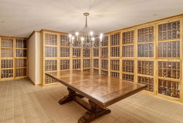 a view of a swimming pool with outdoor seating