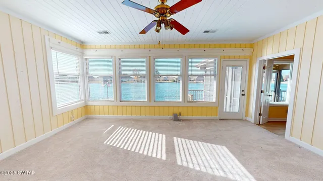 a view of swimming pool with seating space