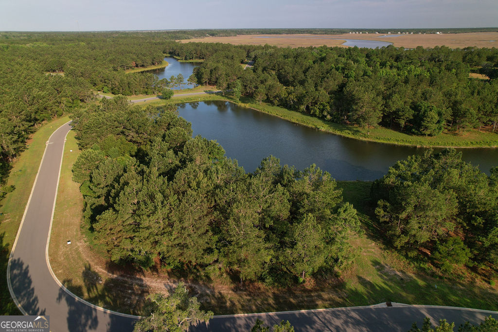 an aerial view of residential house with outdoor space