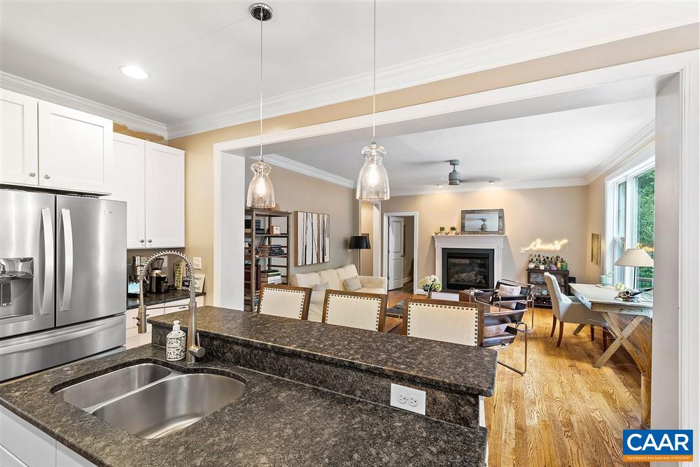 1728 Bending Branch Road Charlottesville, VA 22901 - Photo 12 of 36 a kitchen with stainless steel appliances granite countertop a sink a stove and a refrigerator