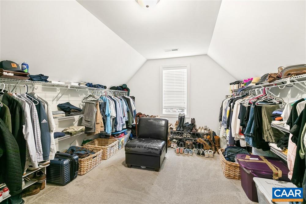 1728 Bending Branch Road Charlottesville, VA 22901 - Photo 24 of 36 walk in closet with clothes and shoes