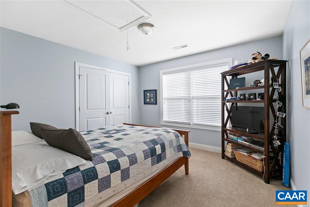 1728 Bending Branch Road Charlottesville, VA 22901 - Photo 25 of 36 a bedroom with a bed and a window