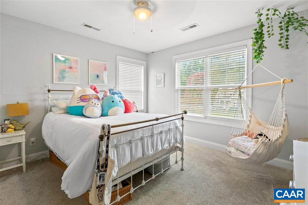 1728 Bending Branch Road Charlottesville, VA 22901 - Photo 27 of 36 a bedroom with furniture and a window