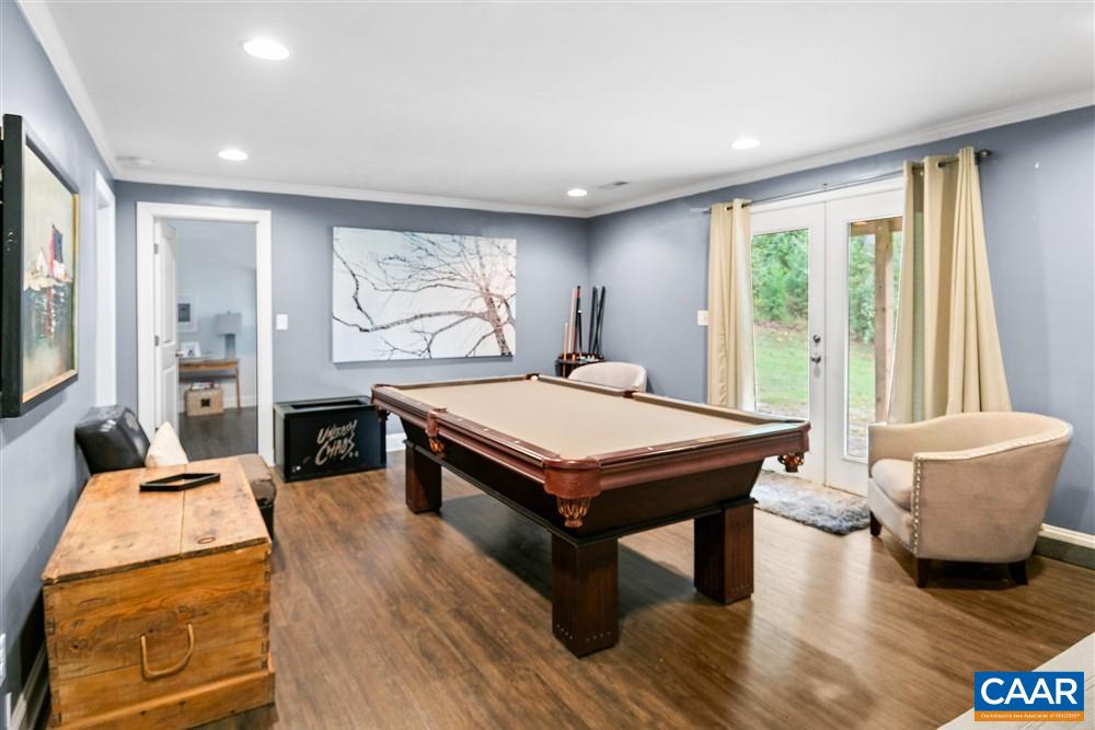 1728 Bending Branch Road Charlottesville, VA 22901 - Photo 31 of 36 a room with furniture pool table wooden floor and windows