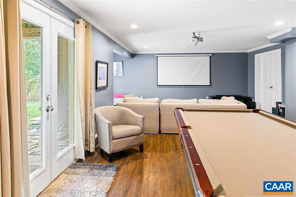 1728 Bending Branch Road Charlottesville, VA 22901 - Photo 32 of 36 a bedroom with a bed and a couch