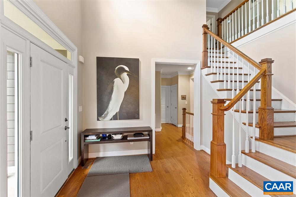 1728 Bending Branch Road Charlottesville, VA 22901 - Photo 6 of 36 a view of a hallway with wooden floor and staircase
