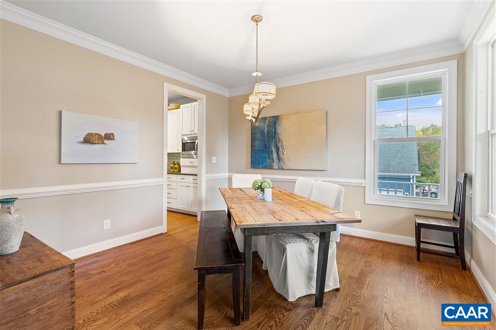 1728 Bending Branch Road Charlottesville, VA 22901 - Photo 7 of 36 a dining room with wooden floor and large windows