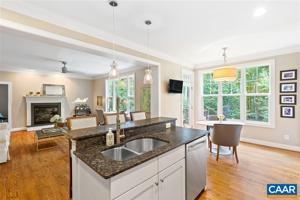1728 Bending Branch Road Charlottesville, VA 22901 - Photo 9 of 36 a view of a kitchen counter top space with furniture and large windows