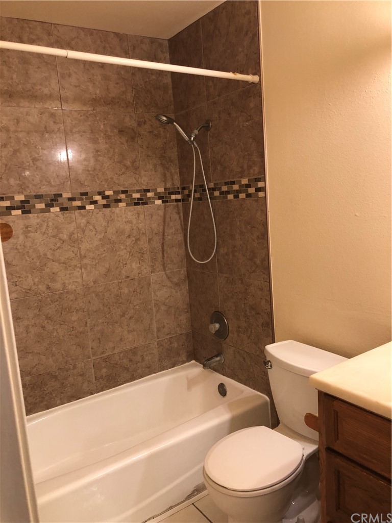 142 West Yale Loop Irvine, CA 92604 - Photo 20 of 28 a bathroom with a toilet and a bath tub