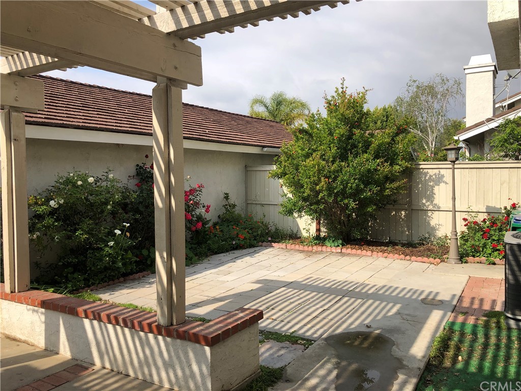 142 West Yale Loop Irvine, CA 92604 - Photo 24 of 28 a view of house with backyard porch and entertaining space