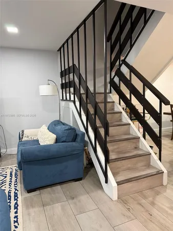 a living room with stairs