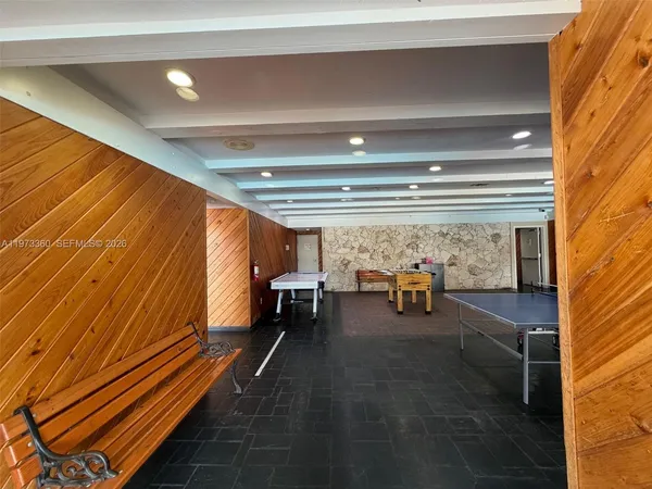 a workspace with furniture and rug