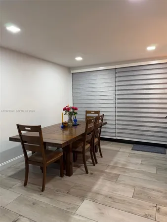 a view of a workspace with furniture