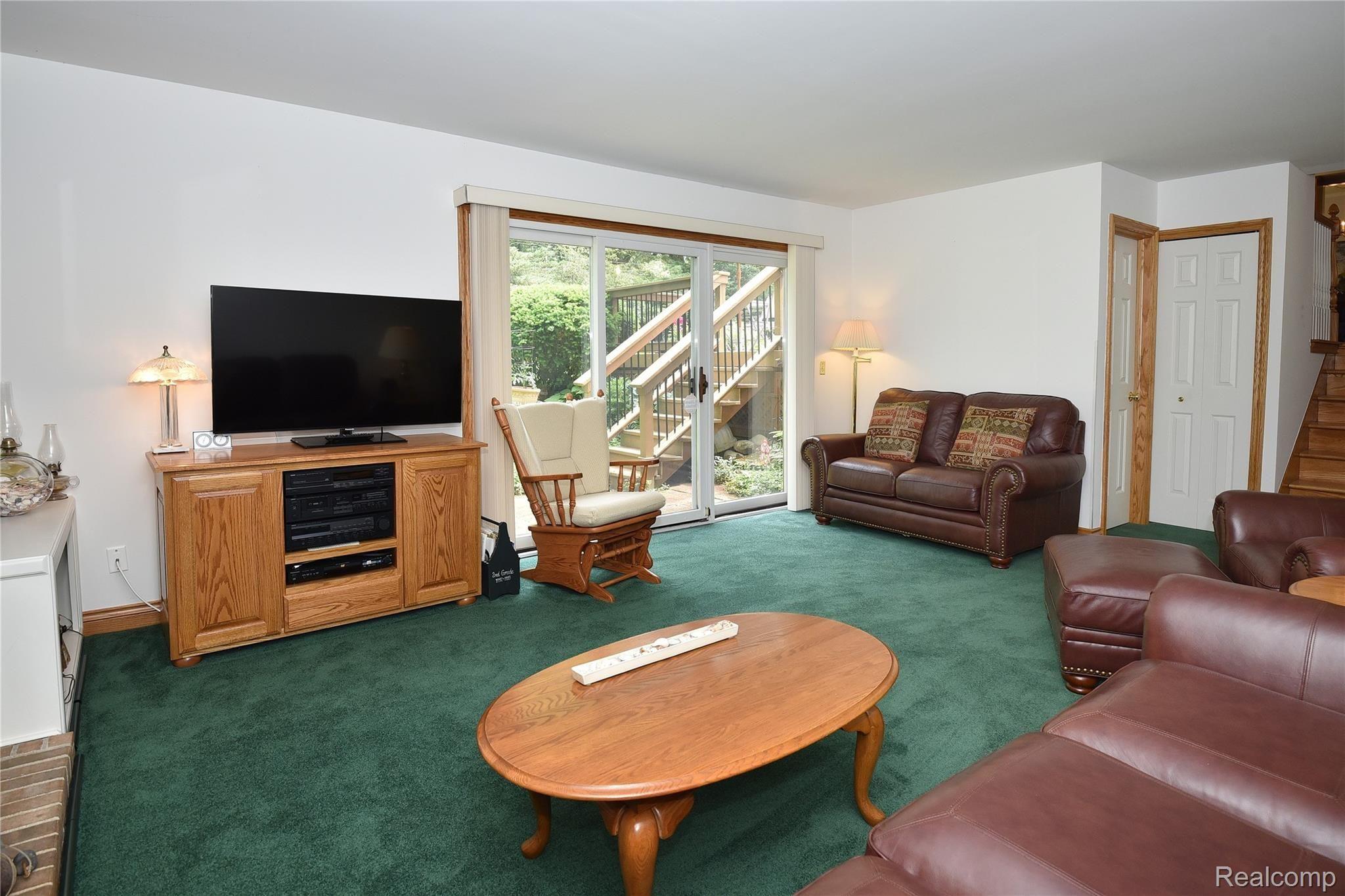 2962 Mohawk Lane Rochester, MI 48306 - Photo 17 of 28 Family Room w/ Natural Gas Fireplace and walkout to beautiful backyard!