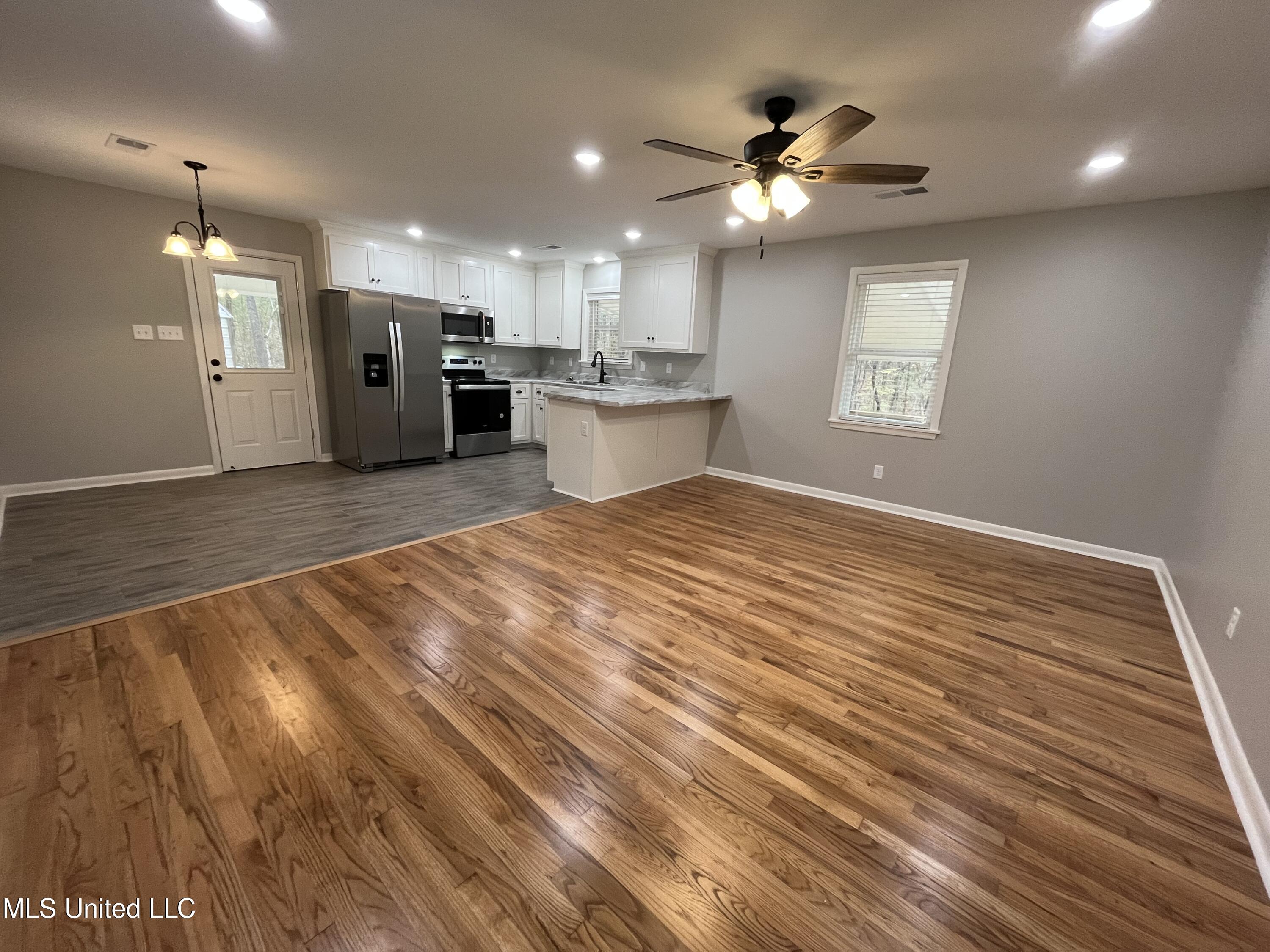 3777 Spring Port Road Sardis, MS 38666 - Photo 22 of 56 Open living room / kitchen