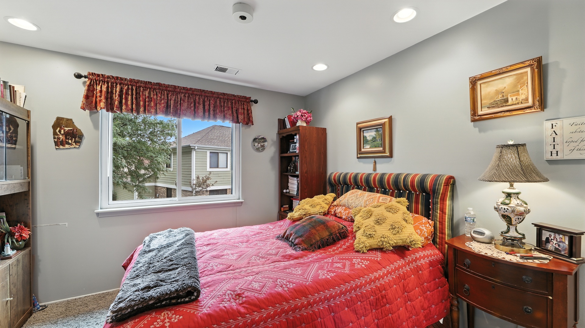 550 Greystone Lane, Unit A2 Wheeling, IL 60090 - Photo 11 of 15 a bedroom with a bed and a window