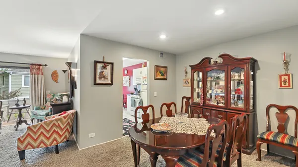 a view of a dining room with furniture