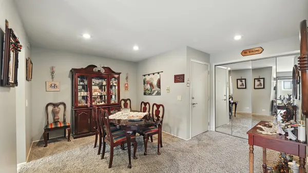 a view of a livingroom with furniture and window