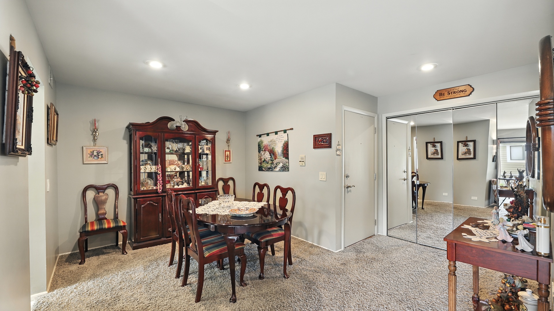 550 Greystone Lane, Unit A2 Wheeling, IL 60090 - Photo 7 of 15 a view of a livingroom with furniture and window