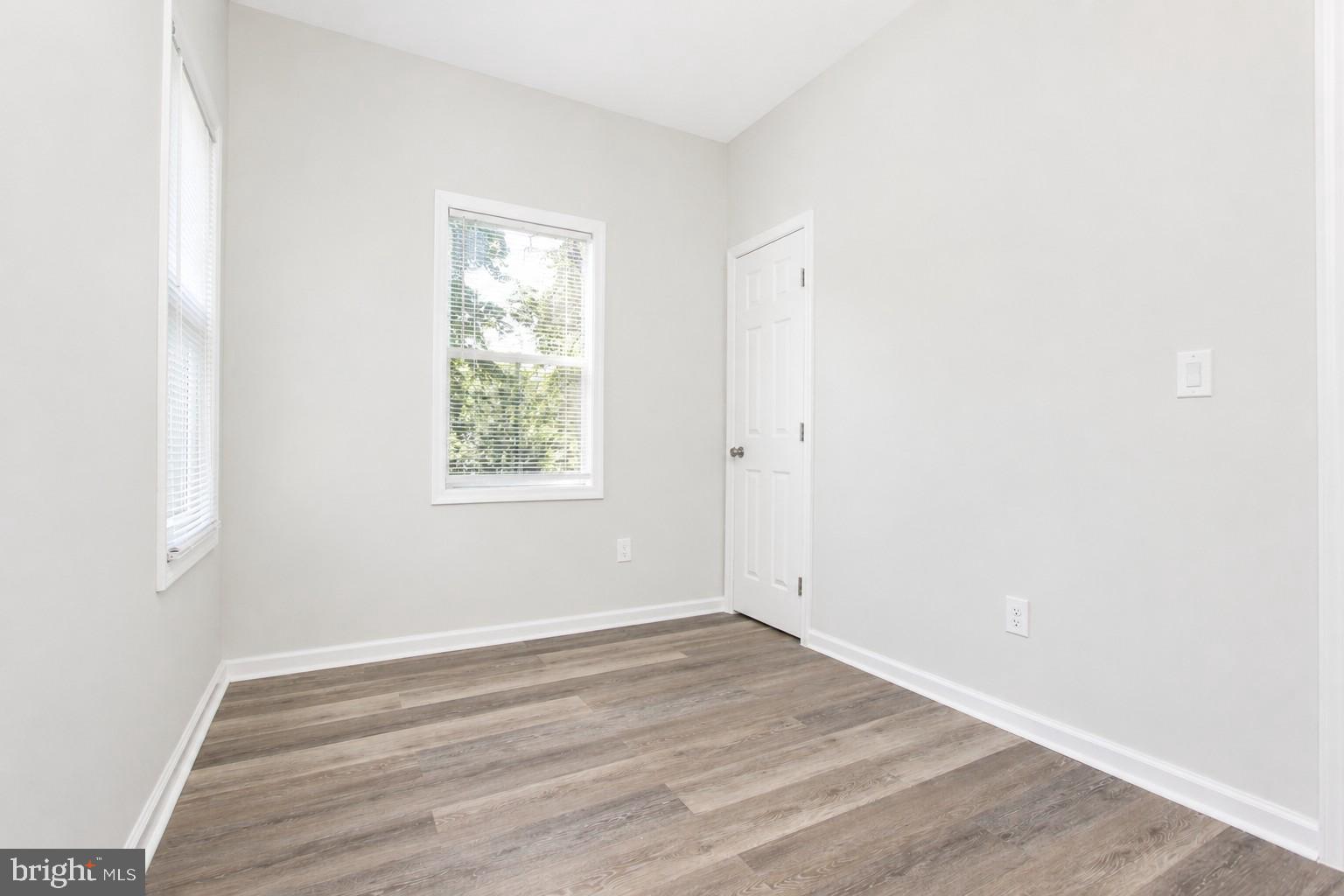 4319 Hadamar Road Spotsylvania, VA 22551 - Photo 22 of 24 an empty room with wooden floor and windows