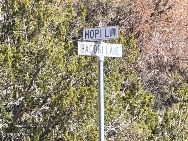 a sign broad in front of a building