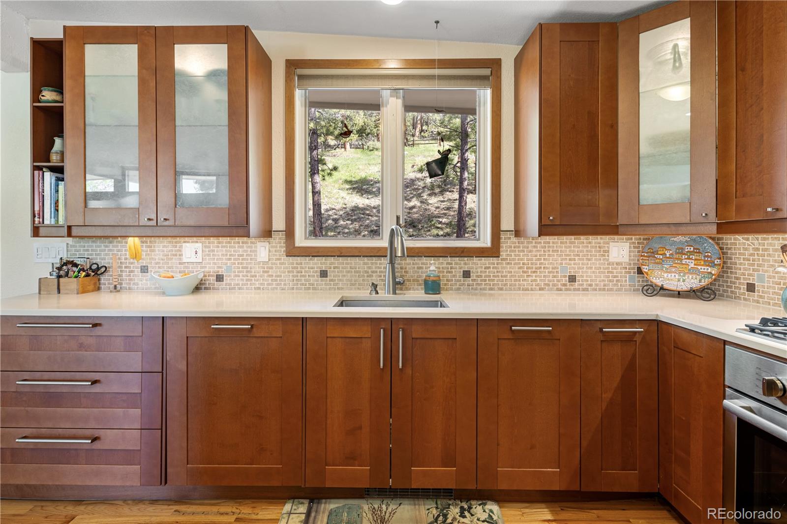 107 Elk Drive Evergreen, CO 80439 - Photo 14 of 45 a bathroom with a sink and a window