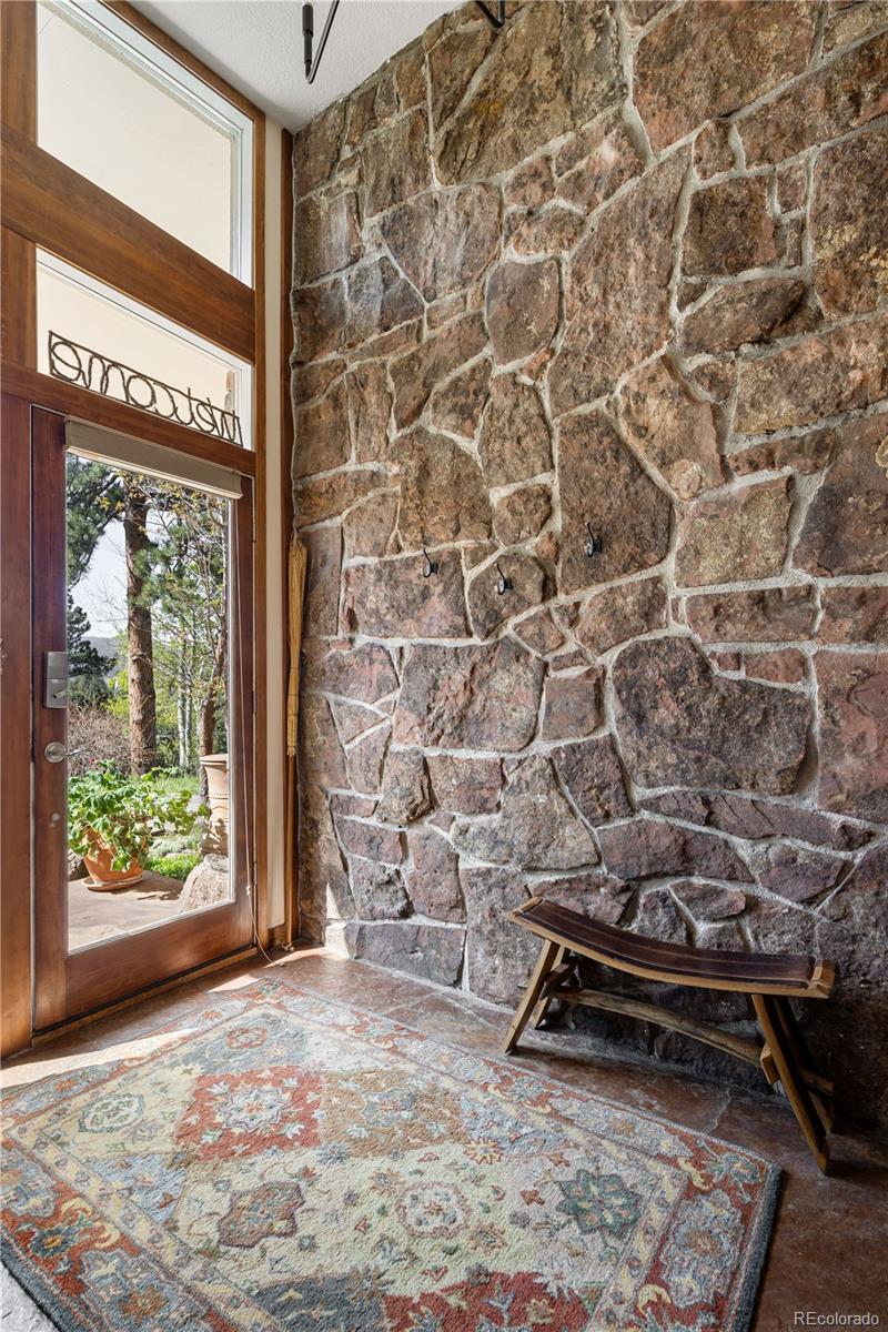 107 Elk Drive Evergreen, CO 80439 - Photo 18 of 45 a room with a rug