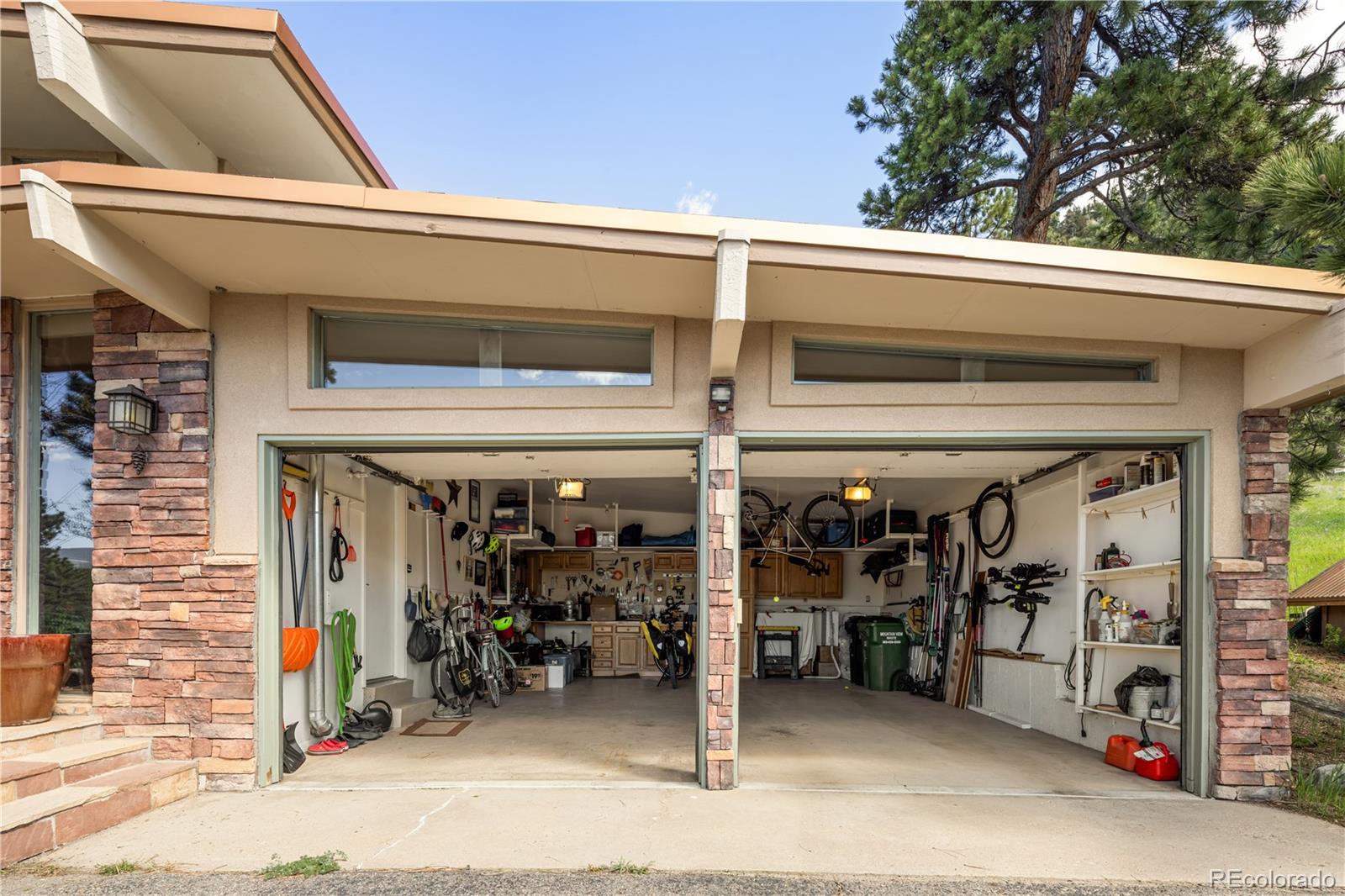 107 Elk Drive Evergreen, CO 80439 - Photo 36 of 45 a view of a garage with storage