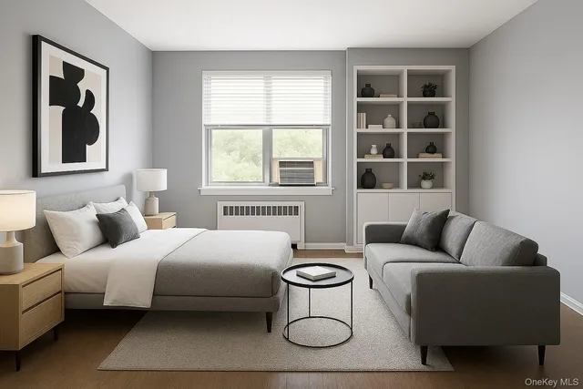 a bedroom with furniture and a window