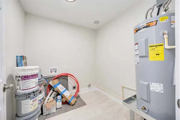 a view of storage and utility room with toys