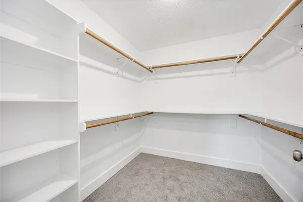a view of an empty walk in closet