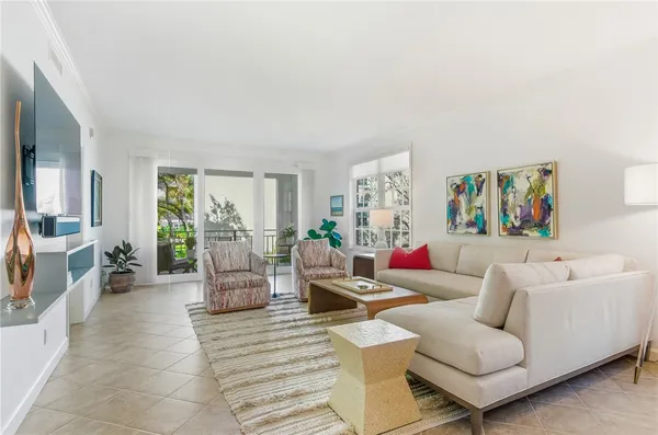 a living room with furniture and a couch