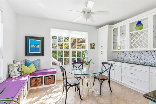 a view of a dining room with furniture window and outside view