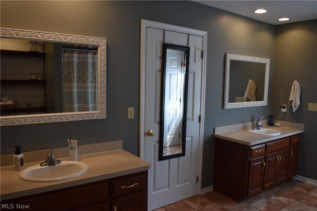 3563 Gorsuch Road Nashport, OH 43830 - Photo 11 of 32 His and Hers master bathroom sinks and storage