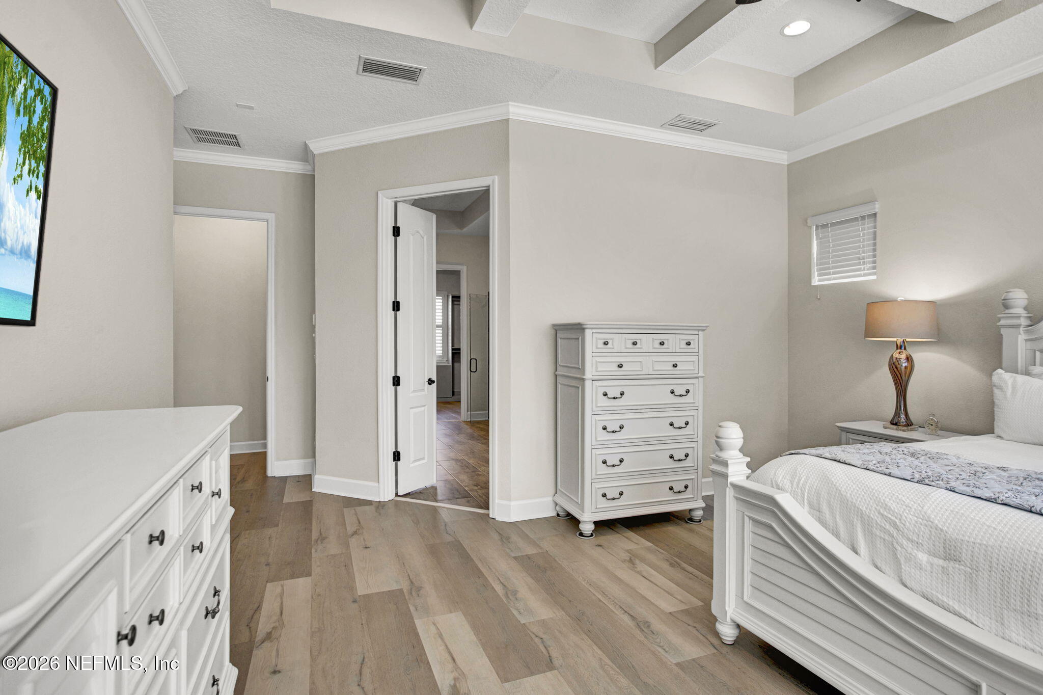 77 Manor Lane St. Johns, FL 32259 - Photo 17 of 41 a view of a bedroom with furniture and wooden floor