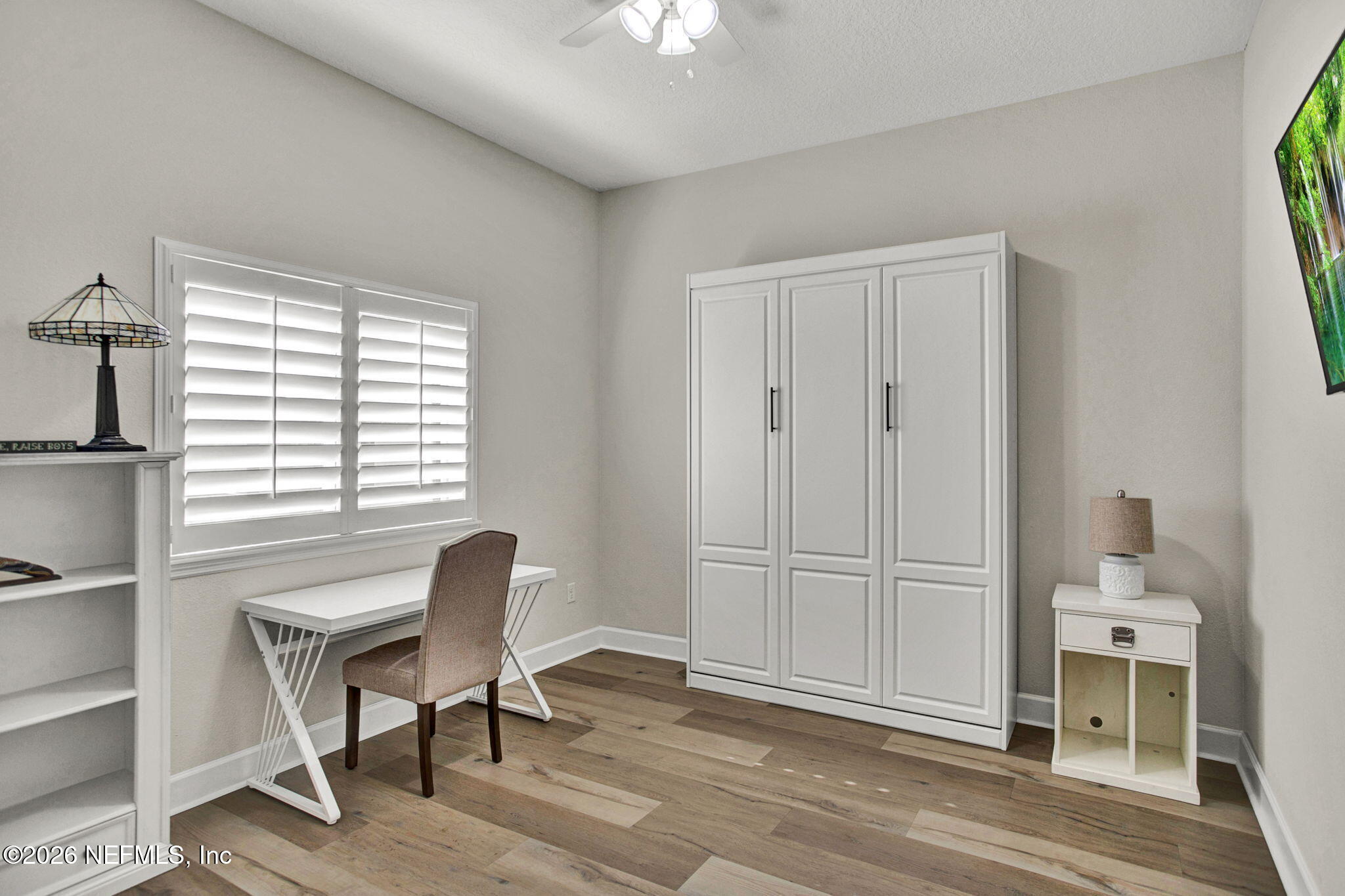 77 Manor Lane St. Johns, FL 32259 - Photo 24 of 41 a workspace with wooden floor and a window