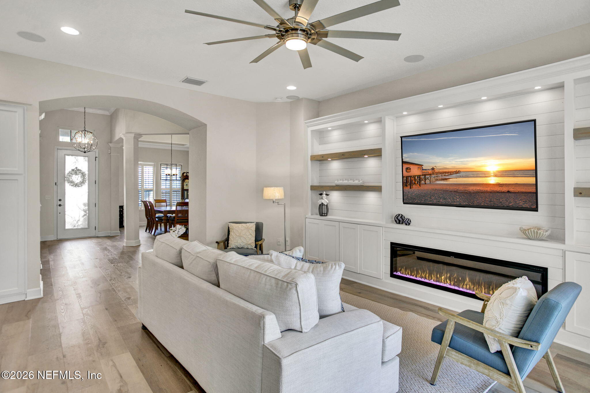 77 Manor Lane St. Johns, FL 32259 - Photo 7 of 41 a living room with furniture and a flat screen tv