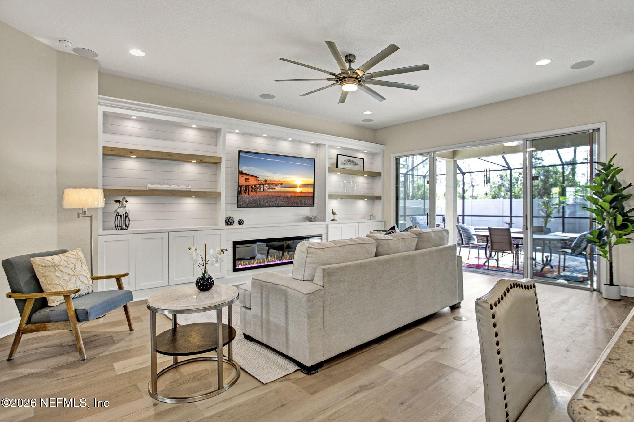 77 Manor Lane St. Johns, FL 32259 - Photo 8 of 41 a living room with furniture and a flat screen tv