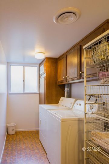 712 Peg Street Ridgecrest, CA 93555 - Photo 18 of 44 a room with storage and utility