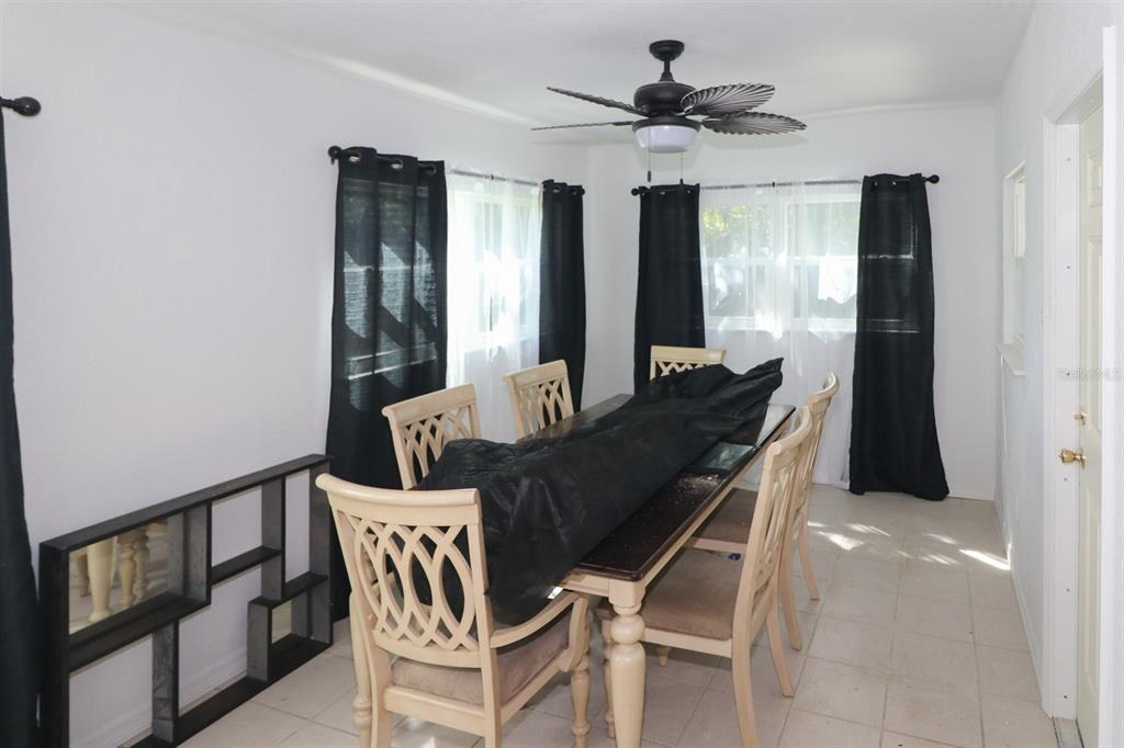 3580 Swanee Road Port Charlotte, FL 33980 - Photo 14 of 22 a dining room with furniture and window