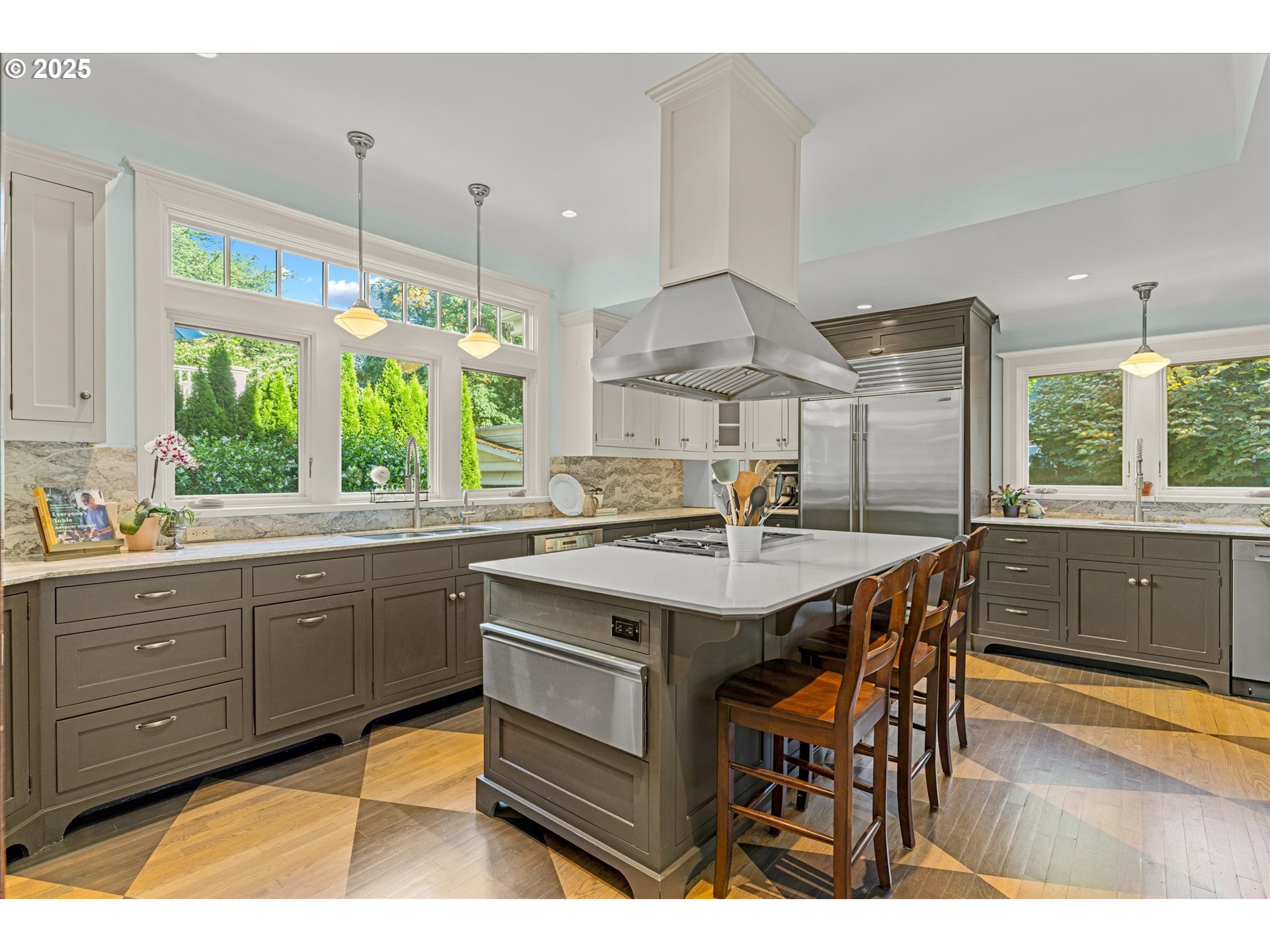 1408 Northeast Knott Street Portland, OR 97212 - Photo 14 of 48 a kitchen with a table and chairs in it