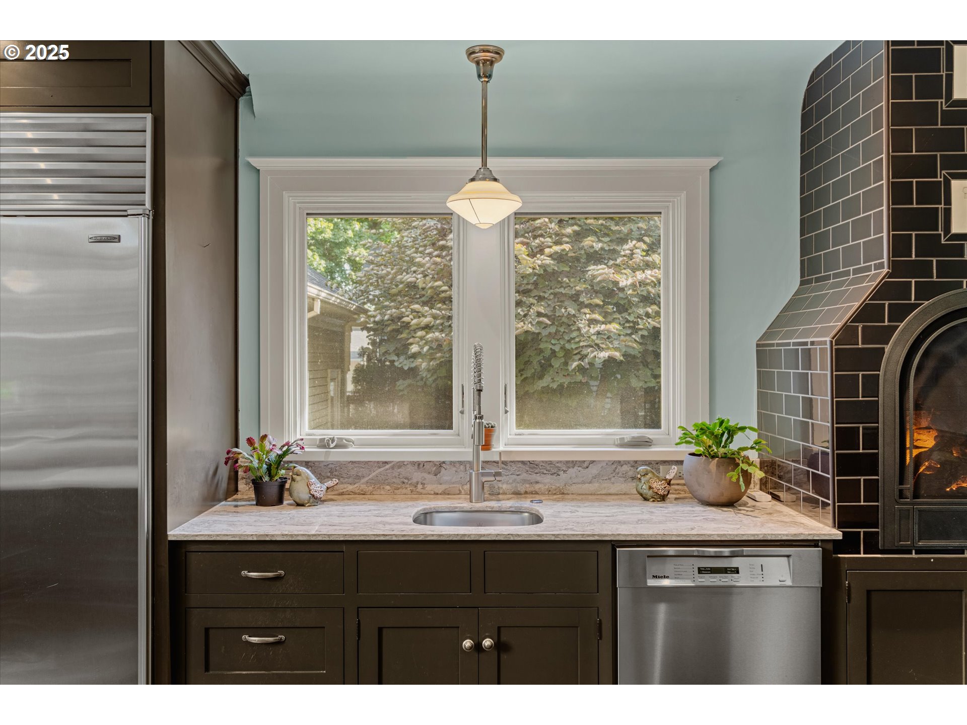 1408 Northeast Knott Street Portland, OR 97212 - Photo 17 of 48 a kitchen with a sink and a window
